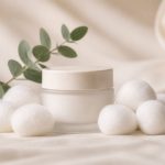 Hypoallergenic cream jar with cotton balls - illustration for Common Skin Allergies and How to Prevent Them