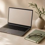 Open laptop with notebook and glasses - illustration for How to research and choose the right healthcare and education options