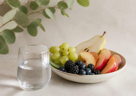 Glass of water and fresh fruit bowl - illustration for How small lifestyle changes can prevent chronic diseases