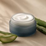 Jar of moisturizer with aloe leaves - illustration for What Is a Skin Clinic? Treatments, Services & What to Expect
