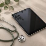 Stethoscope beside a digital tablet on table - illustration for Why Vivora Clinic is your top choice for personalized care in 2026